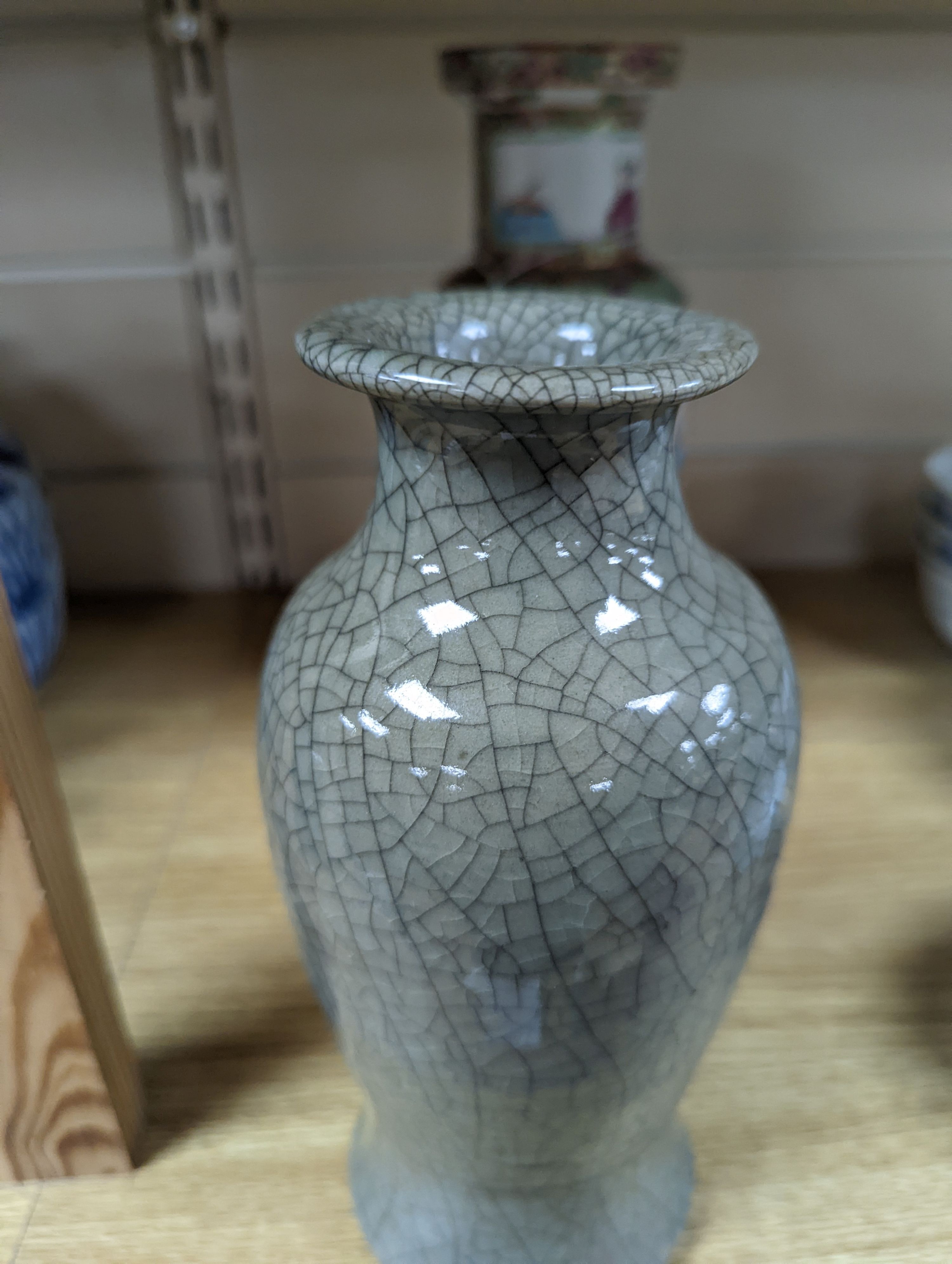 Two Chinese famille rose vases and a Celadon crackle glazed vase, 19th-century and later, tallest 25 cm